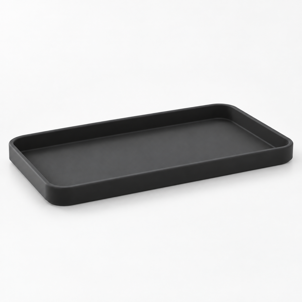 Low-profile black silicone sink tray viewed from the side
