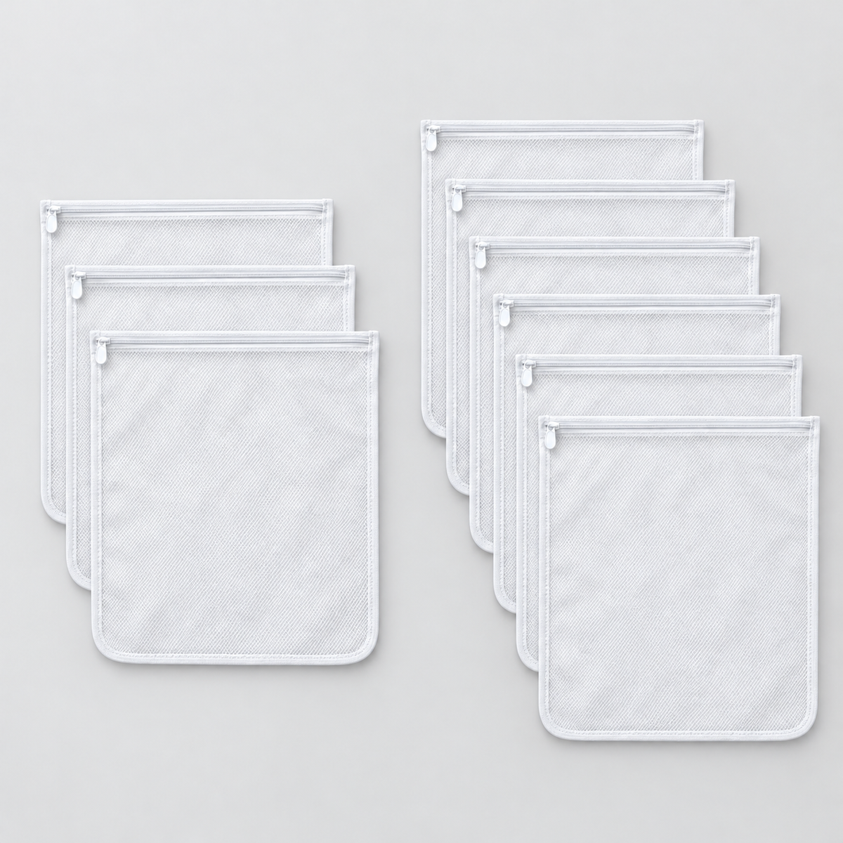 Three-pack and six-pack of identical mesh laundry bags
