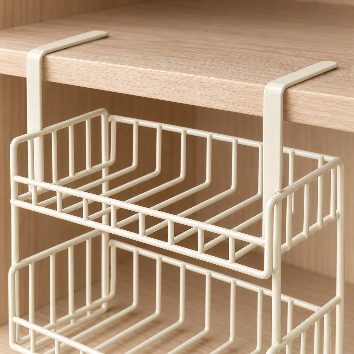 Hook detail on a cream steel basket fitted over a compatible shelf